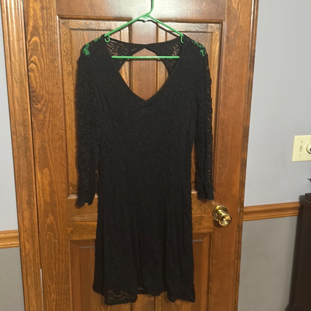Women’s black lace cocktail dress with a keyhole back